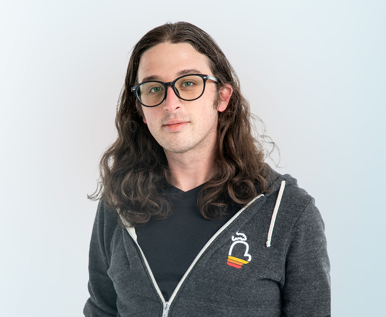 Professional headshot of Tom Smith